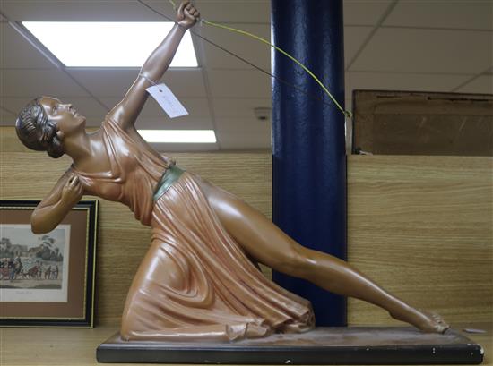 An Art Deco composition figure of a female archer